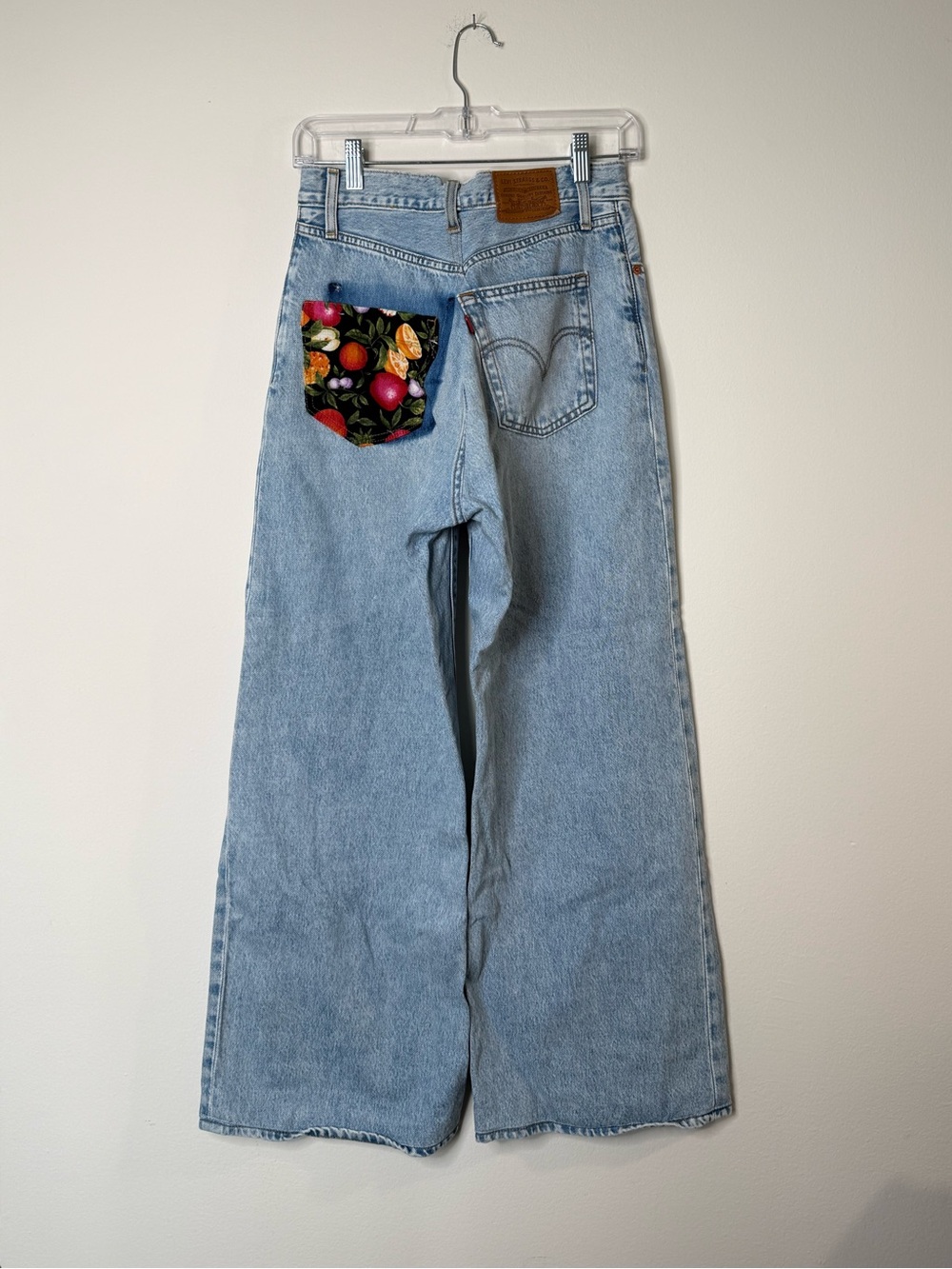 Levi’s Light Wash Women’s Wide-Leg High Rise Jeans with Floral Patch Pocket